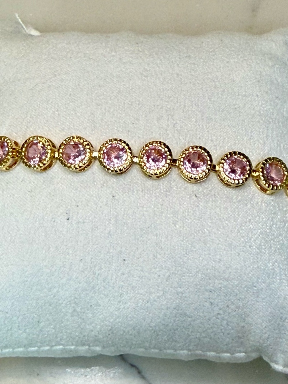 Pink tennis bracelet with round cz stones 14k gold plated, 7 inches